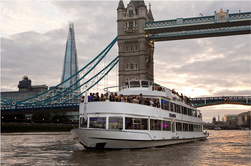 private hire vessel sailing down river thames