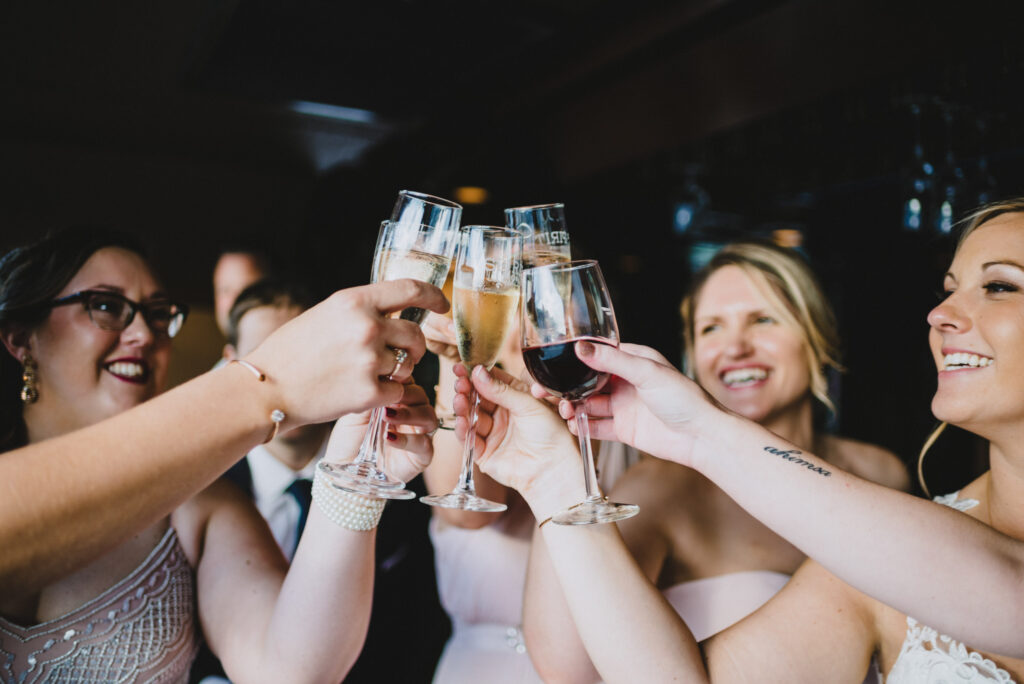 women toasting with drinks